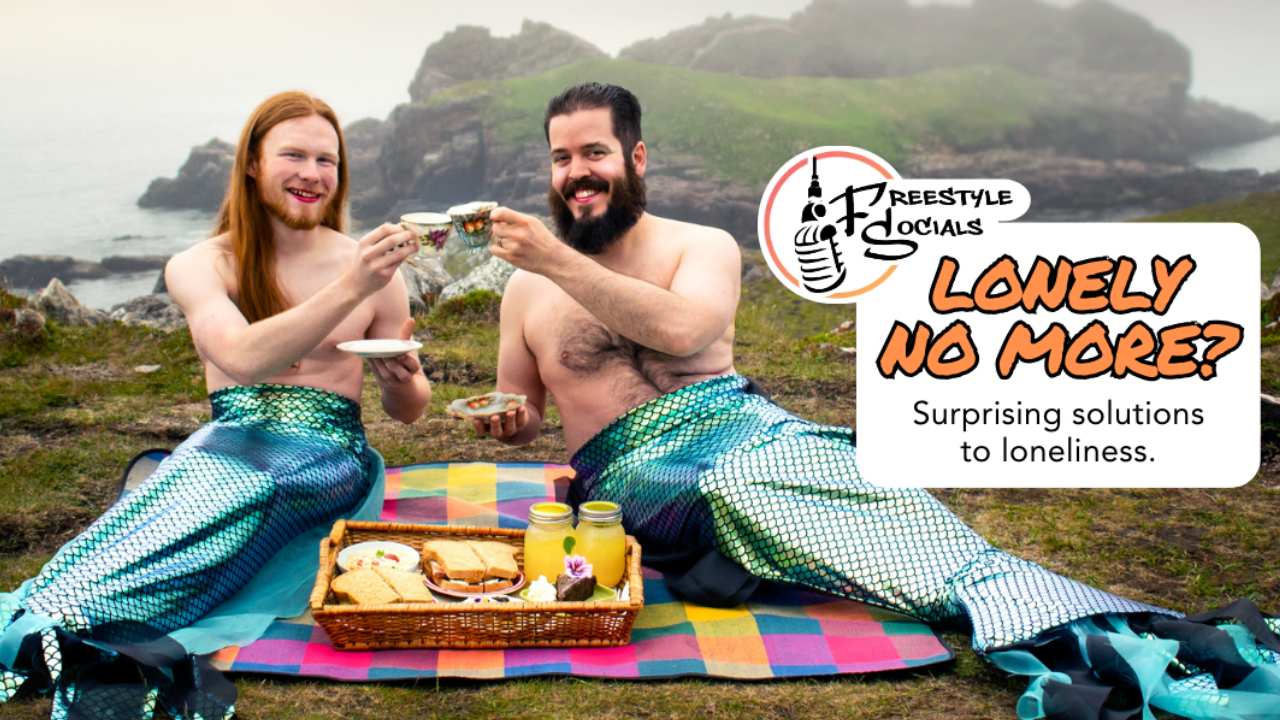 two bearded mermen having a picnic